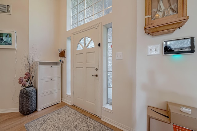 foyer entrance featuring light hardwood / wood-style floors