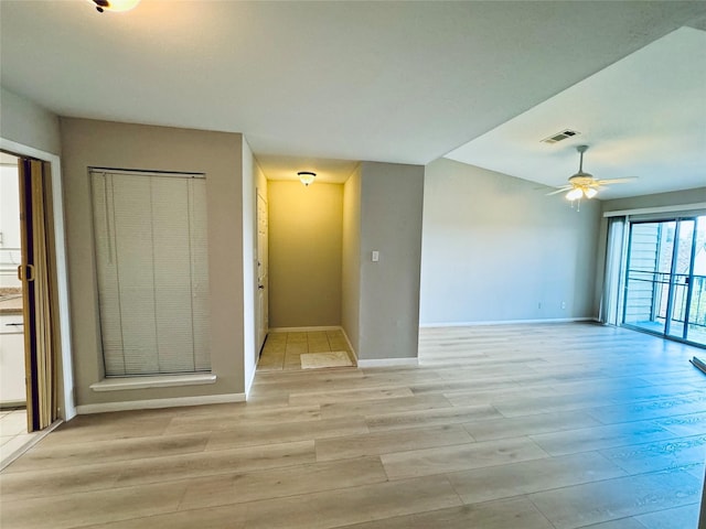 unfurnished room with light hardwood / wood-style floors and ceiling fan