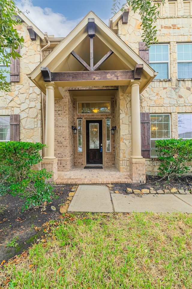 doorway to property featuring a porch