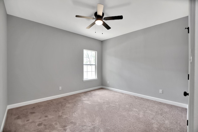 unfurnished room featuring carpet flooring and ceiling fan