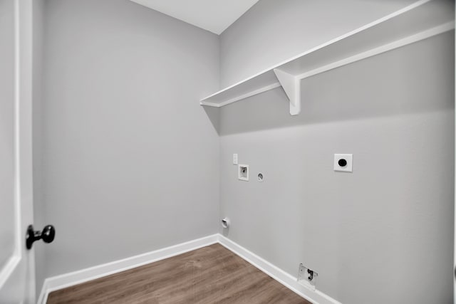 laundry room featuring hookup for an electric dryer, hookup for a washing machine, hardwood / wood-style flooring, and hookup for a gas dryer