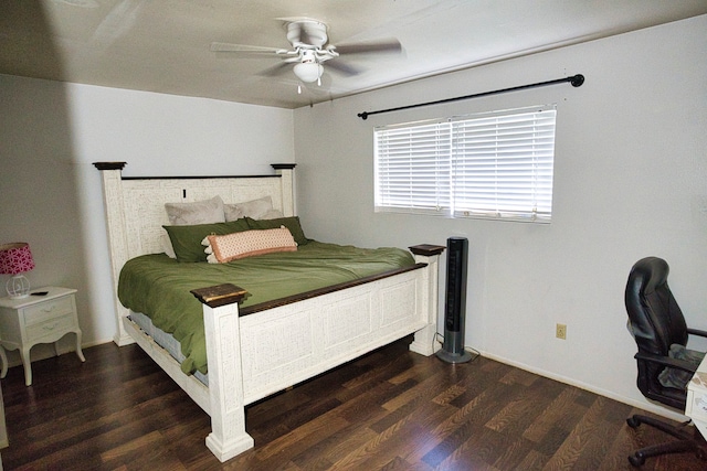 bedroom featuring ceiling fan and dark hardwood / wood-style flooring