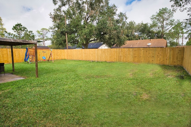 view of yard featuring a playground