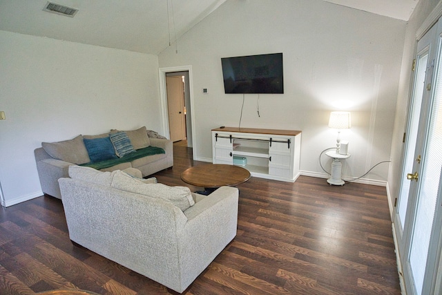 living room featuring high vaulted ceiling and dark hardwood / wood-style flooring