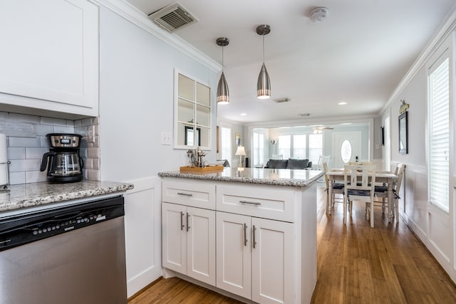 kitchen featuring dishwasher, white cabinetry, kitchen peninsula, and hardwood / wood-style flooring