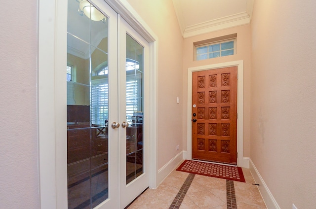 interior space with french doors, light tile patterned floors, and crown molding