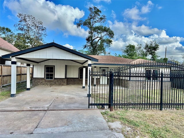 exterior space featuring a carport