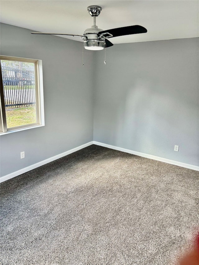 unfurnished room featuring carpet flooring and ceiling fan