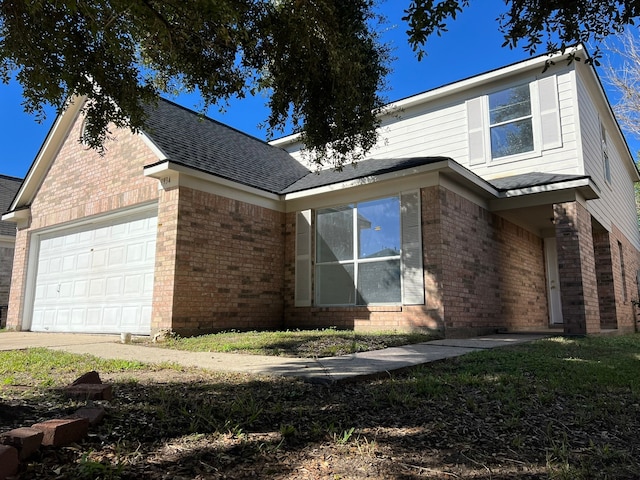 view of side of property with a garage