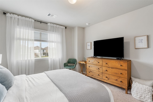 bedroom featuring carpet