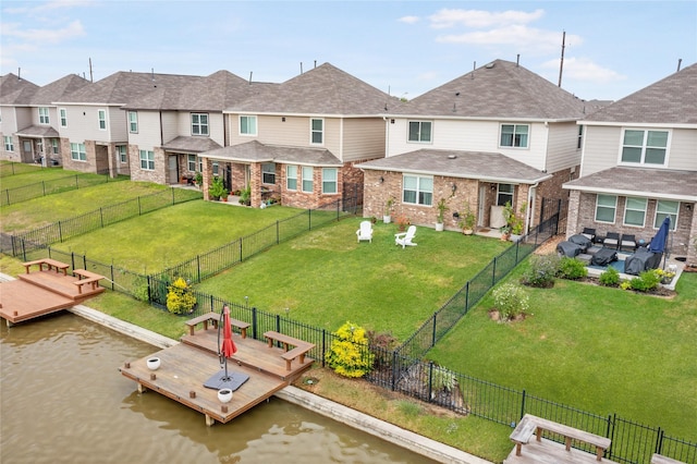 exterior space with a water view