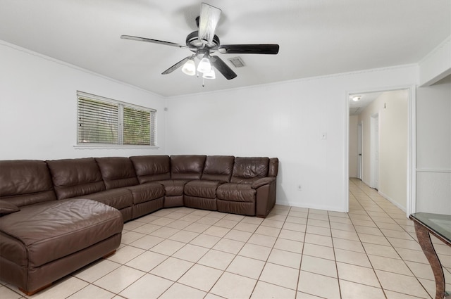 living room featuring light tile patterned floors, crown molding, and ceiling fan