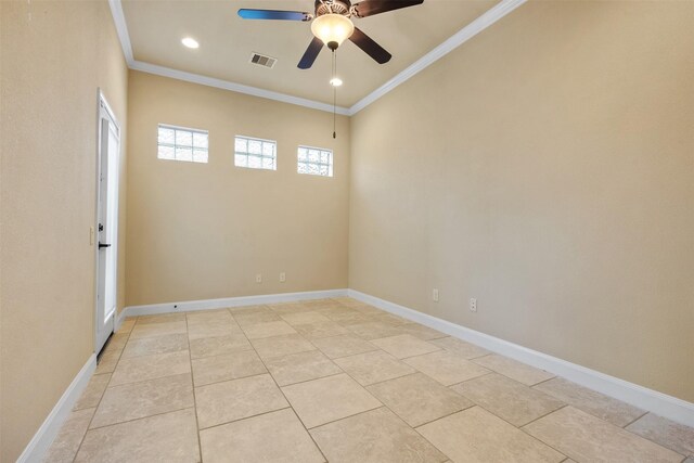 tiled empty room with ceiling fan and crown molding