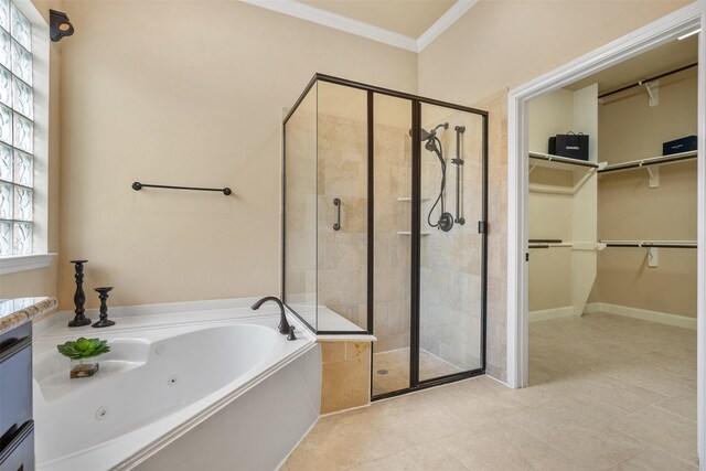 bathroom featuring tile patterned flooring, shower with separate bathtub, and crown molding