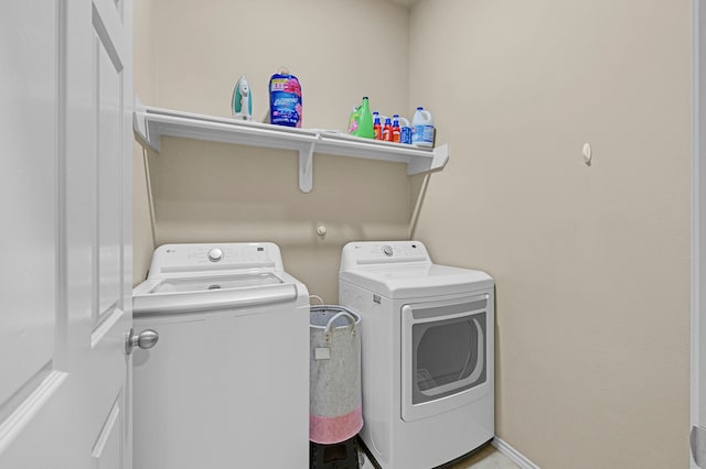 laundry area featuring washing machine and dryer