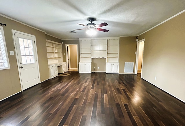 unfurnished living room featuring ceiling fan, dark hardwood / wood-style floors, and ornamental molding