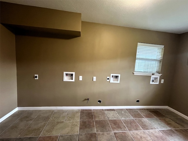 clothes washing area featuring hookup for an electric dryer, washer hookup, and gas dryer hookup