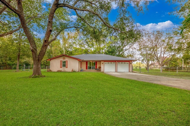 ranch-style house with a garage and a front lawn