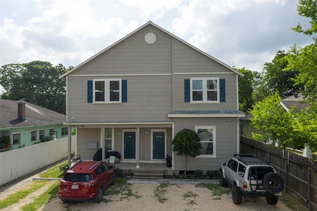 view of property with a porch