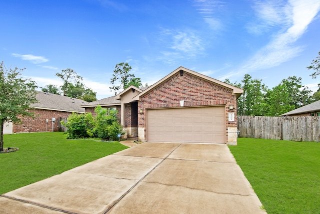 view of front facade featuring a front yard and a garage