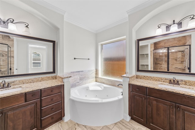 bathroom with plus walk in shower, vanity, and ornamental molding