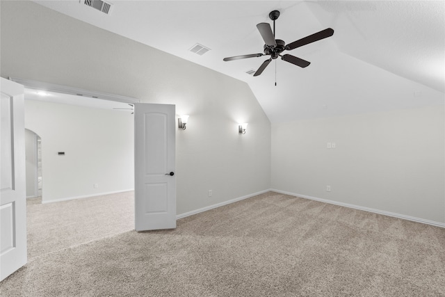 bonus room featuring ceiling fan, carpet floors, and vaulted ceiling