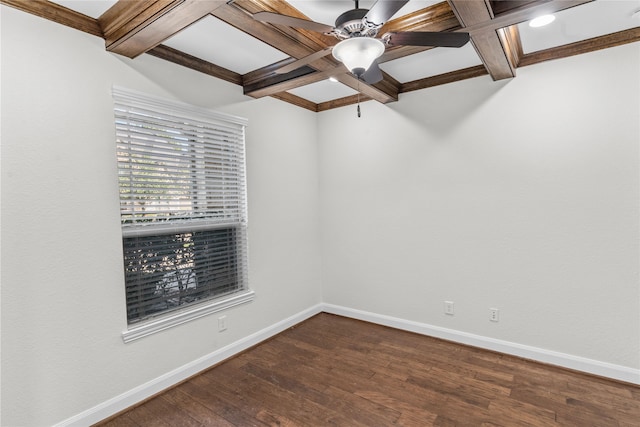 spare room featuring beamed ceiling, dark hardwood / wood-style floors, ceiling fan, and coffered ceiling