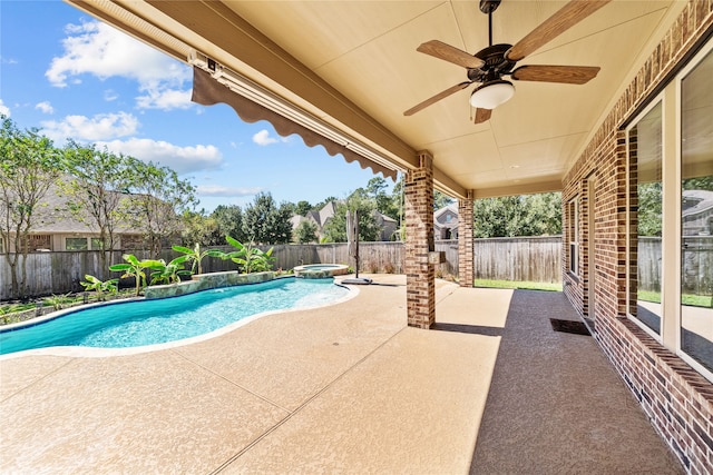 view of pool featuring ceiling fan and a patio area