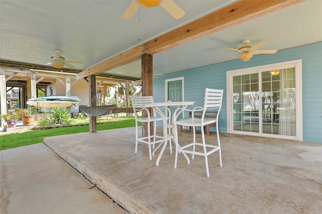 view of patio with ceiling fan