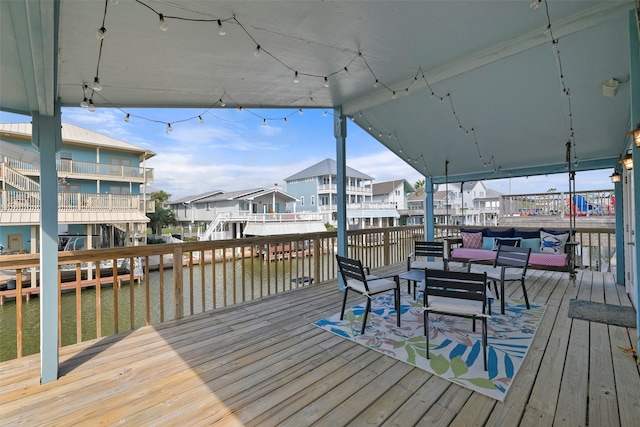 deck featuring a water view