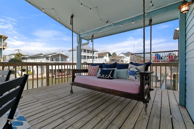 wooden terrace with a water view