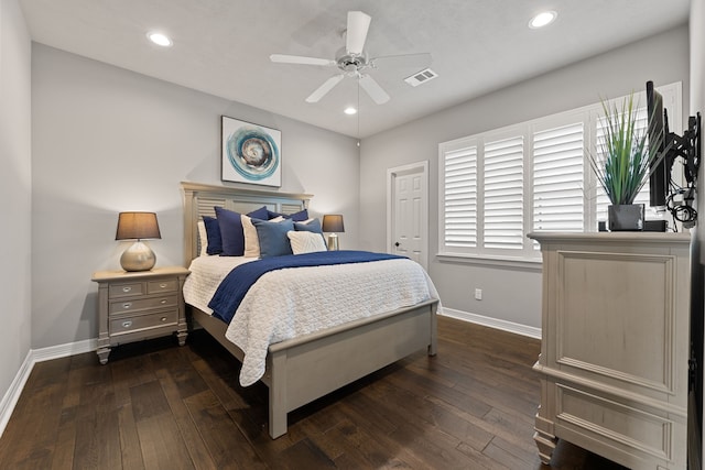 bedroom featuring ceiling fan and dark hardwood / wood-style flooring