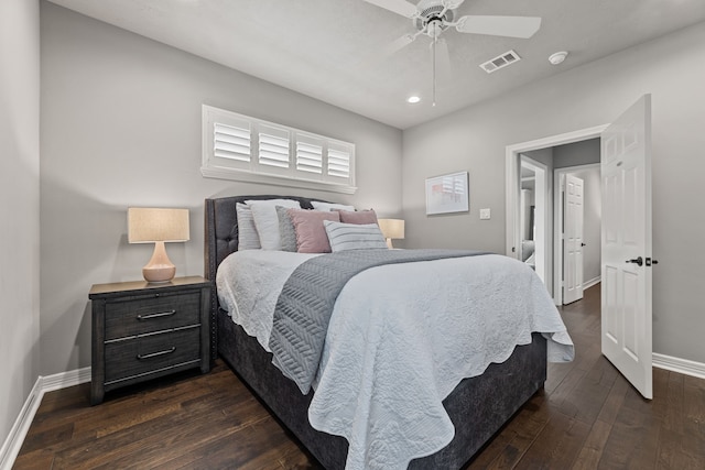 bedroom featuring dark hardwood / wood-style flooring and ceiling fan