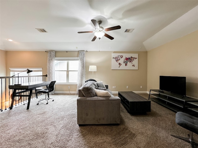 carpeted living room with ceiling fan