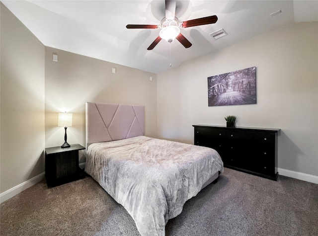 carpeted bedroom featuring lofted ceiling and ceiling fan