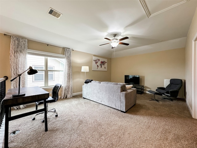 carpeted office featuring ceiling fan