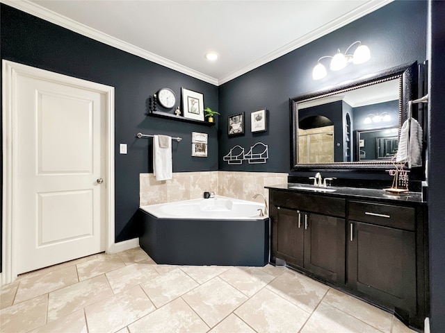 bathroom featuring tile patterned flooring, a bathtub, vanity, and crown molding