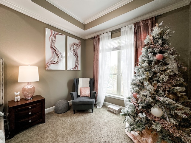 living area with carpet flooring and crown molding