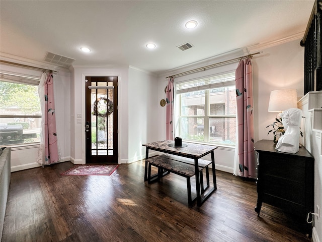 home office featuring dark hardwood / wood-style flooring and crown molding