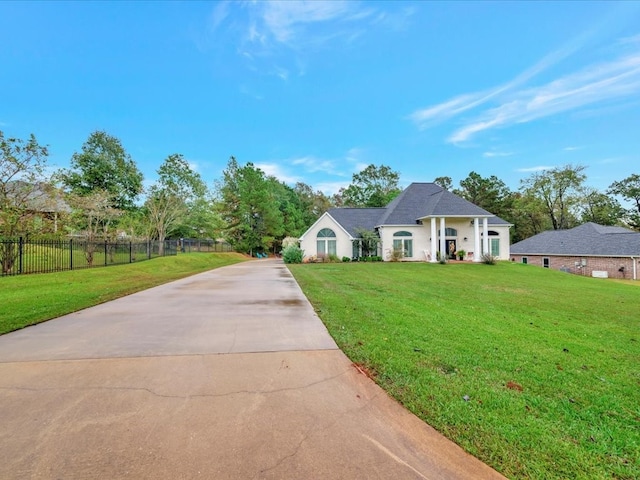 view of front facade with a front lawn