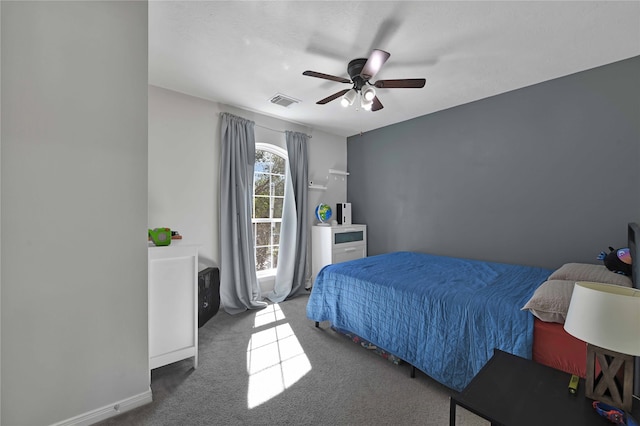 bedroom featuring ceiling fan and carpet floors