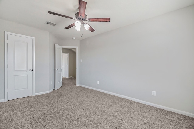 unfurnished bedroom with carpet floors and ceiling fan