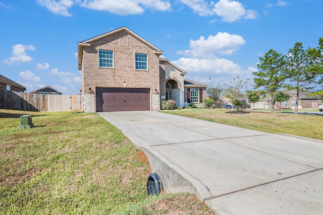 front facade with a garage and a front yard