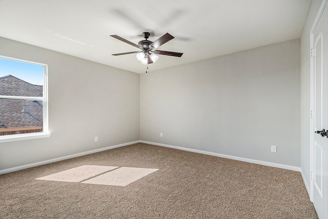 carpeted empty room with ceiling fan