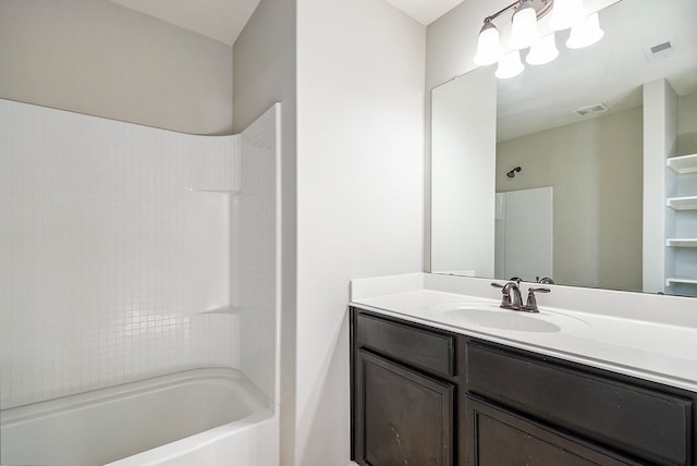 bathroom with vanity and tub / shower combination