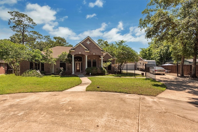 view of front property featuring a front yard and covered porch