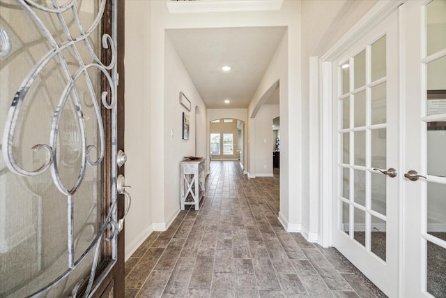 foyer entrance featuring french doors