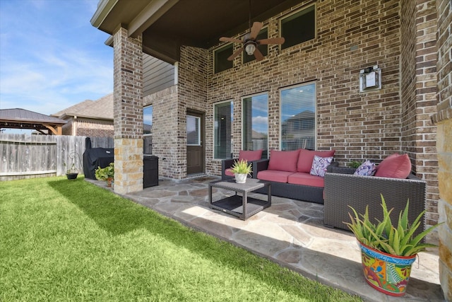 view of patio / terrace with ceiling fan and an outdoor hangout area