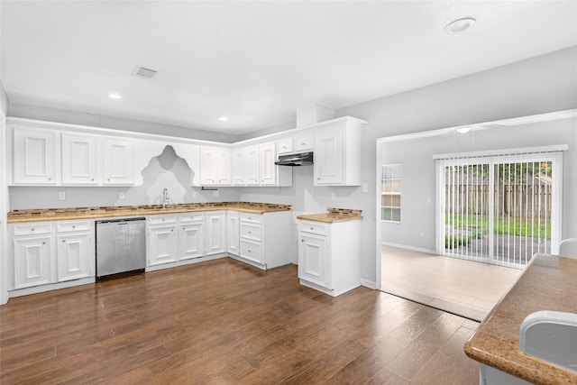 kitchen with white cabinets, dark hardwood / wood-style flooring, sink, and dishwasher