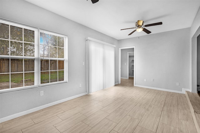 spare room featuring ceiling fan